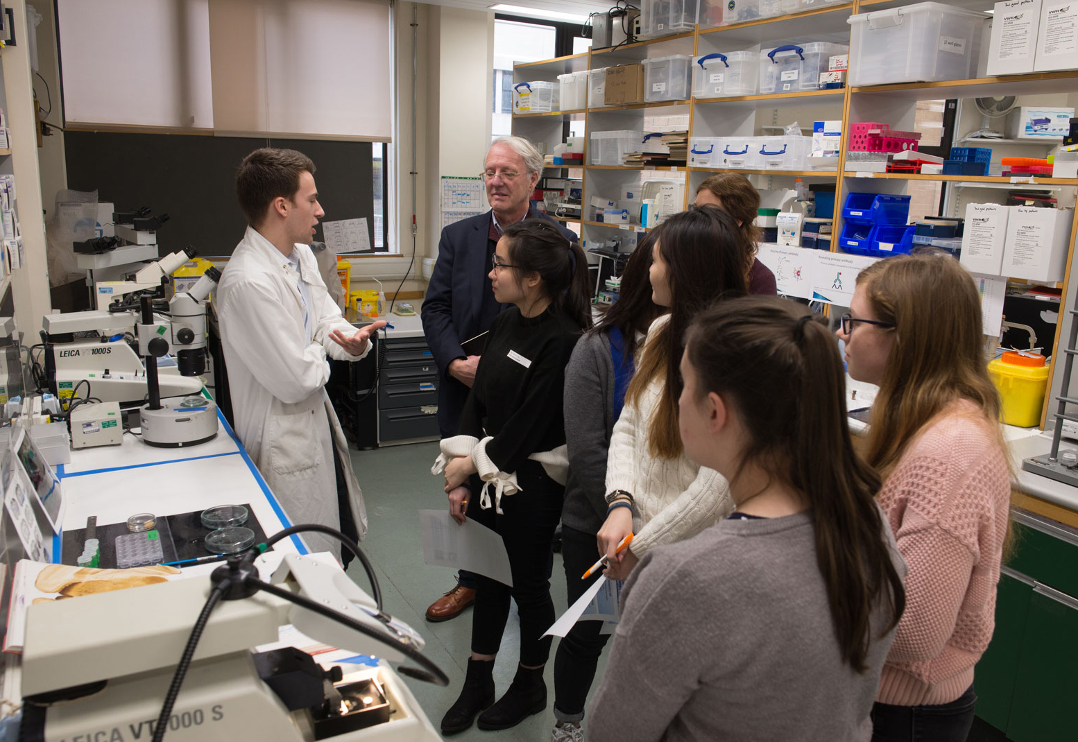 Pupils visited real working labs, where they could see for themselves some of the techniques and equipment used in the Unit’s research on the brain. Here, student Michael Orrell (left) demonstrates some of technologies he uses to study brain structure.