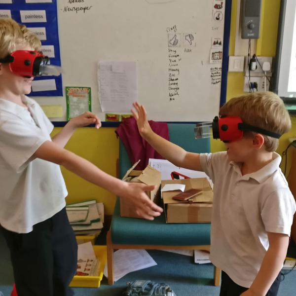 Shaking hands is tricky when you're wearing reversing goggles.