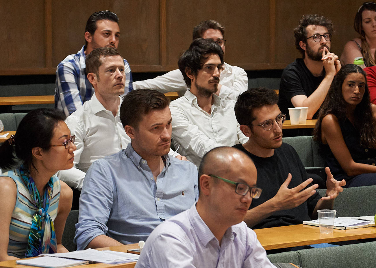 Unit student Giulio Spagnol (centre right) takes the opportunity to ask some key questions at the summer Science Day 2018.