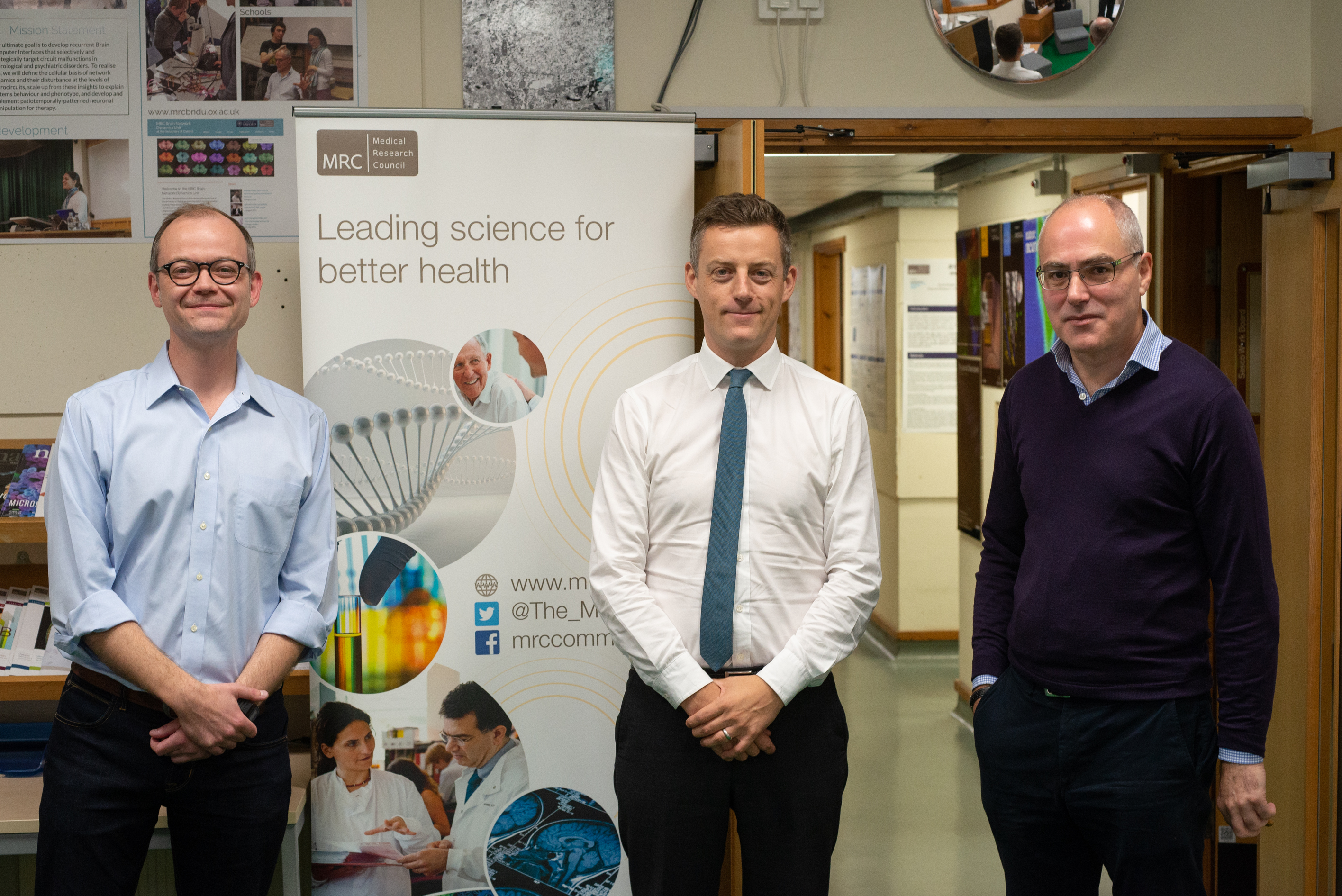 From left to right: Unit Deputy Director Peter Magill, Lord O’Shaughnessy, and Unit Director Peter Brown