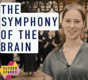 Photo of a woman with 'The Symphony of the Brain' text
