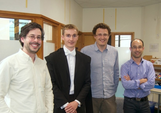 After the viva: (from left to right) a satisfied External Examiner, the happy student, an equally satisfied second Examiner, and a proud supervisor.