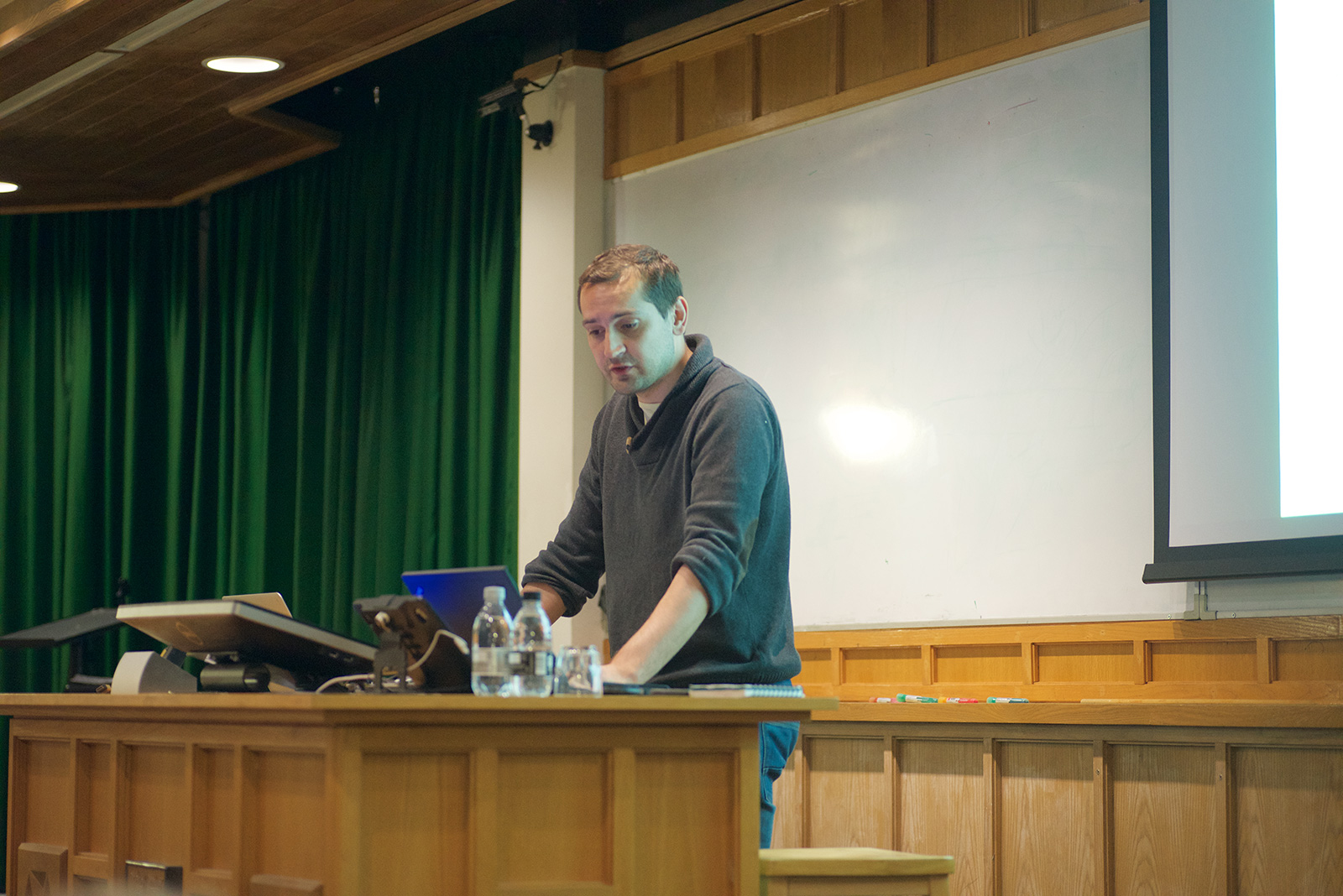 Unit postdoctoral research associate John-Stuart Brittain presents his clinical research.