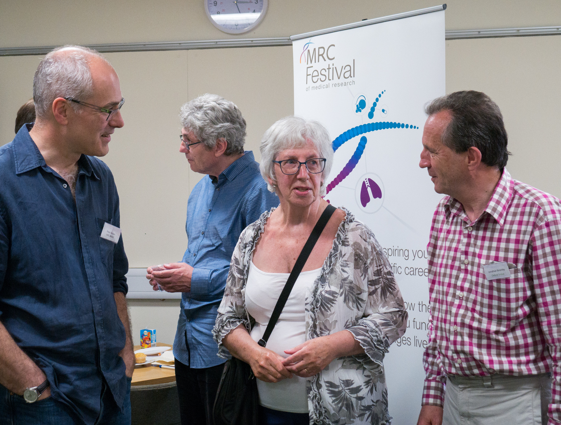 Unit Director Professor Peter Brown (left) chats with visitors to the Unit’s open day for people affected by Parkinson’s.