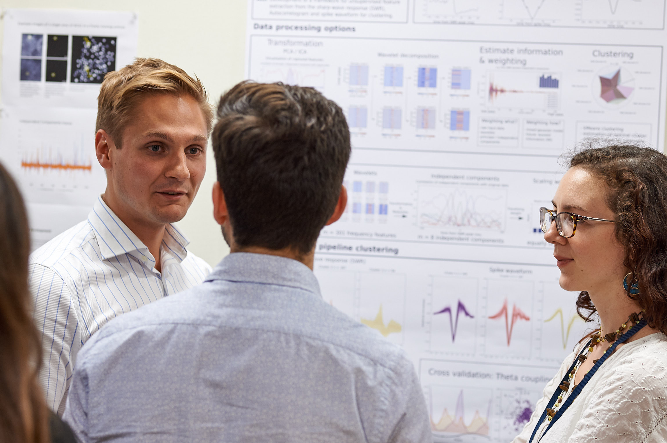 Oxford MSc in Neuroscience student Roman Rothaermel (left) discusses his summer research project undertaken at the Unit.