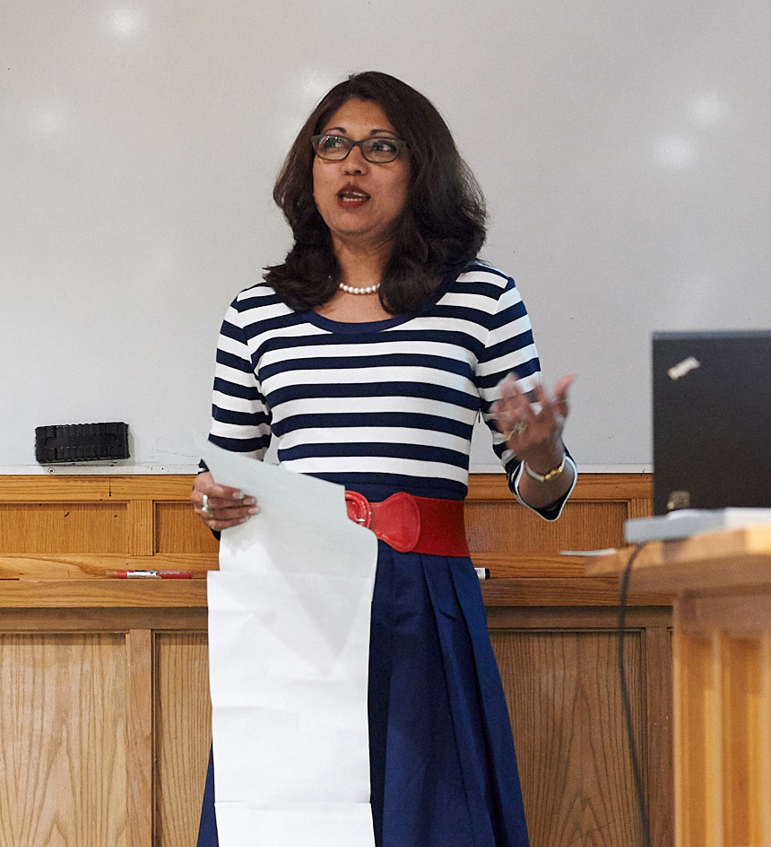 Unit member Savita Anderson begins her “short speech” after receiving the annual Director’s Award for Public Engagement.