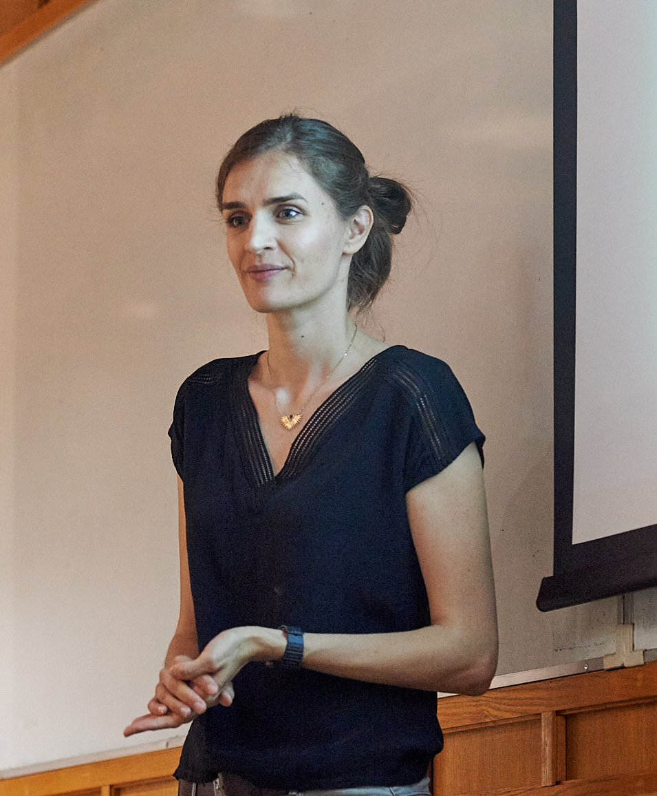 Unit postdoctoral scientist Stephanie Trouche takes questions after discussing the interactions between hippocampus and basal ganglia.