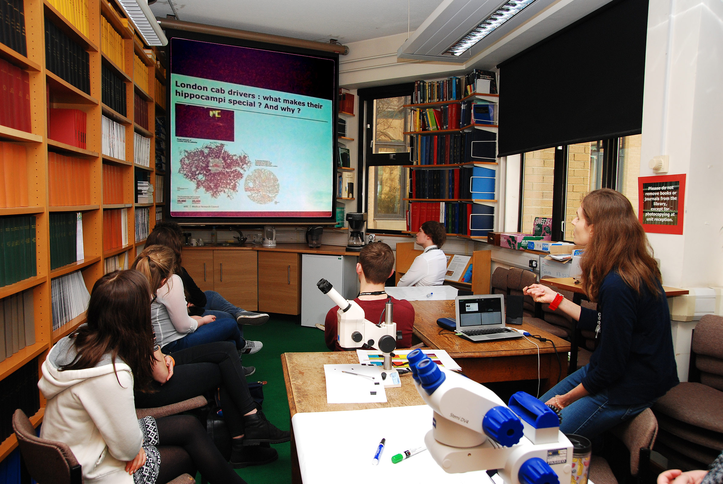 Unit scientist Dr Stephanie Trouche gives visiting pupils a virtual tour of some brain circuits underlying memory.