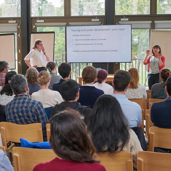 Photo of Mary Myers talking to the audience at the Unit Training and Careers Development Event 2025.
