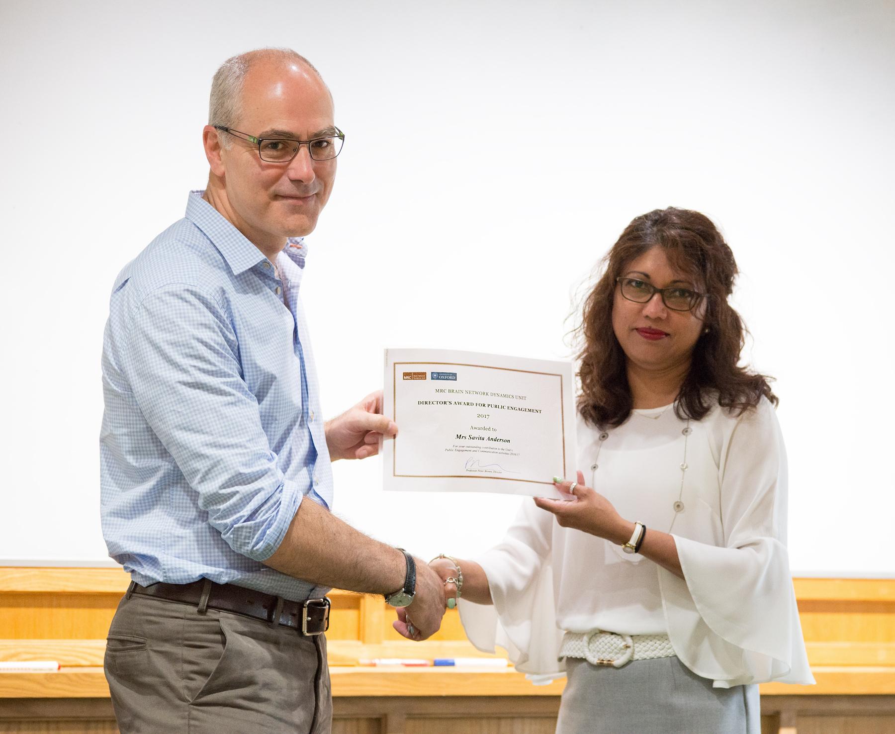 Professor Peter Brown with Mrs Savita Anderson, winner of the Director’s Award for Public Engagement for 2017. Professor Peter Brown with Mrs Savita Anderson, winner of the Director’s Award for Public Engagement for 2017.