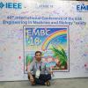 Ahmar takes a moment to rest at the IEEE conference in Hawaii.