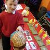 Pupils using 'brain hats' to discover roles of brain areas.