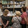 Unit student Luke Bryden (left) engages visitors with his practical demonstration of some of the lab equipment and techniques used at the Unit for its research on Parkinson’s disease.